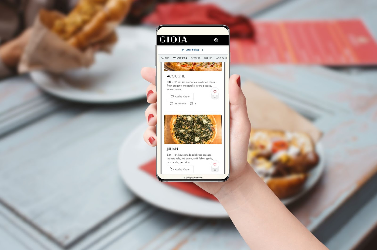 Phone displaying Gioia’s dynamic online menu with dish photos